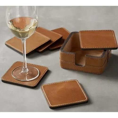 Elevate your table setting with our Handmade Leather Coaster Sets. Crafted from premium leather, these coasters combine elegance and functionality, protecting your surfaces in style.